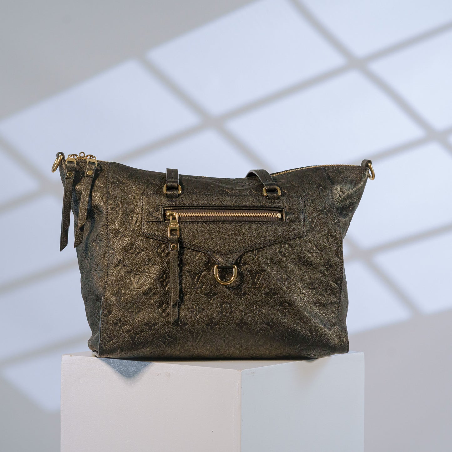 Louis Vuitton black Empreinte leather tote bag with gold hardware and zip front pocket