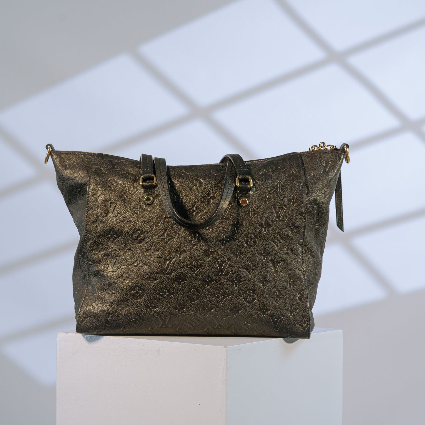 Louis Vuitton Monogram Empreinte leather tote bag with top handles and gold-tone details